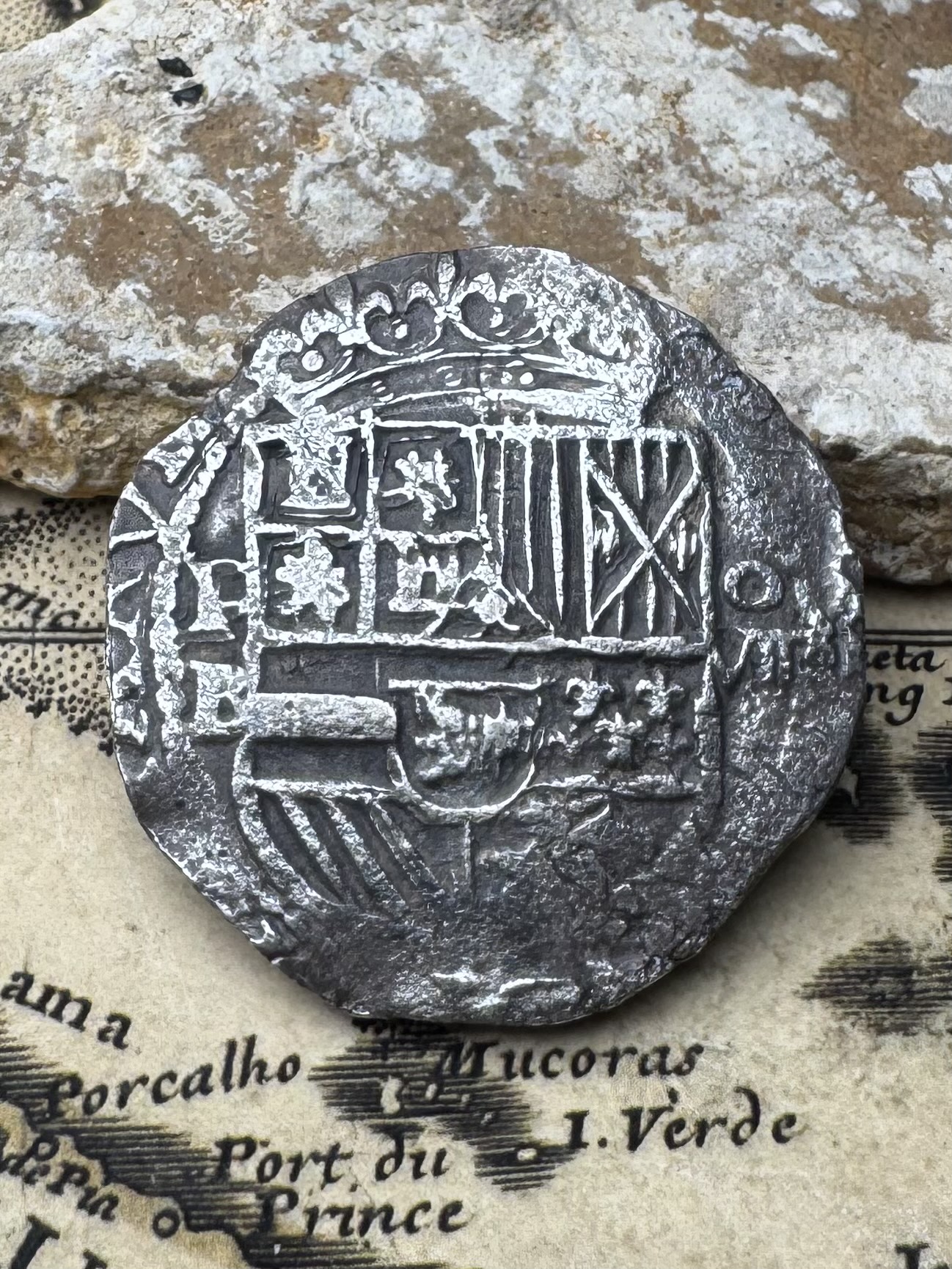 Philip III 8 reales silver cob showing the crowned Habsburg shield