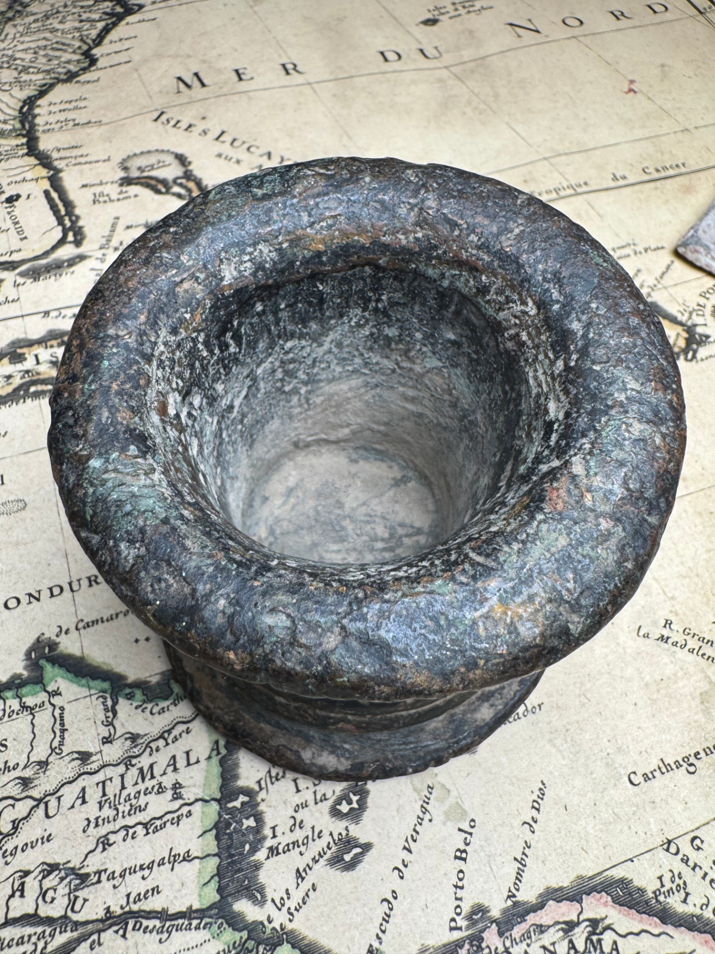 Top view down the bore of the inscribed bronze thunder mug