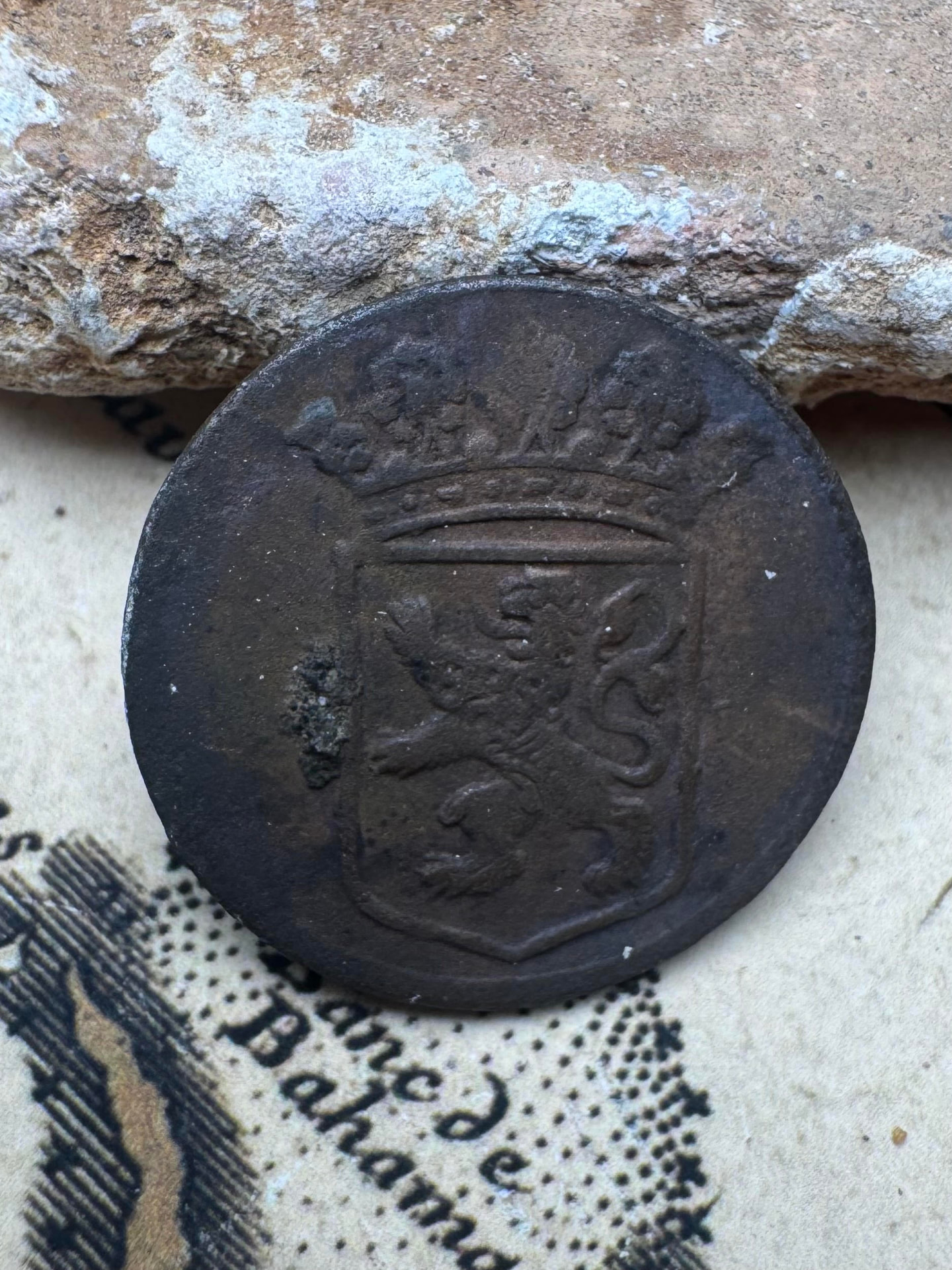 Reverse of the VOC coin showing the crowned Holland lion shield